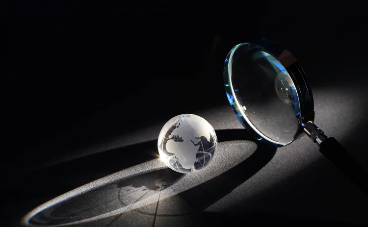 Magnifying glass _ globe _ global _ search - web - Getty.jpg